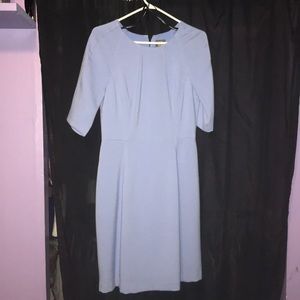 A blue thick dress. Very formal dress